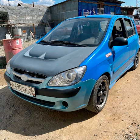 Пластиковый капот с воздухоотводами для Hyundai Getz рестайлинг (2004-2007 г.в.) купить недорого с доставкой в Чита