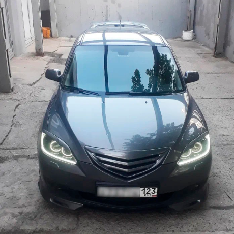Накладки на фары (реснички) "Корнер" для Mazda 3 хэтчбэк (2003-2009) купить недорого с доставкой в Чита